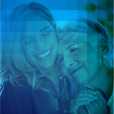 Smiling family members embracing and showing support.