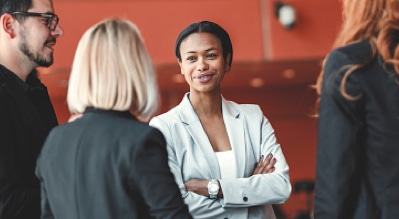 Funeral service professionals networking and collaborating at an event