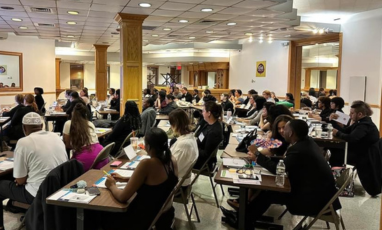 Training attendees sitting at tables.