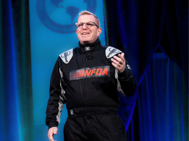 Man in a stockcar racing suit.