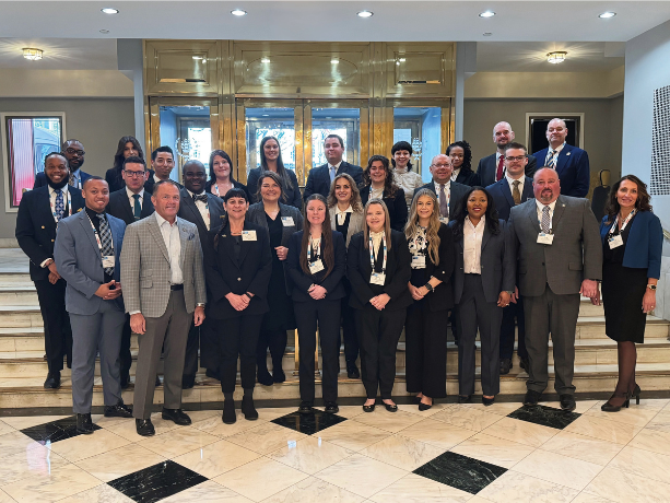 Group picture of professionals who attended an event.